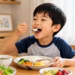 preventing picky eating, a baby happily exploring colorful vegetables