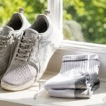 how to fix smelly feet, shoes airing out beside fresh socks and foot powder